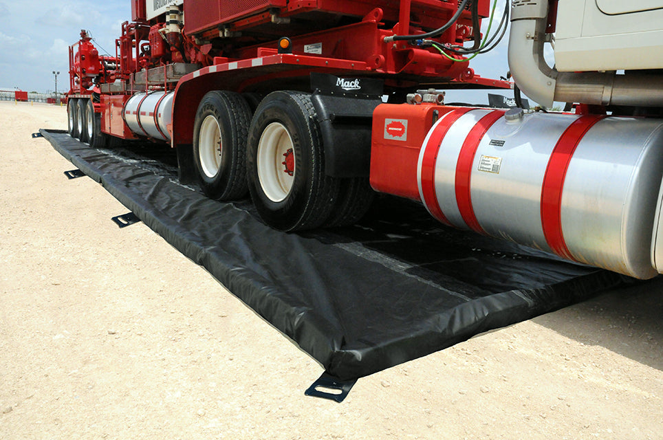 Truck parked inside an UltraTech foam wall spill containment berm