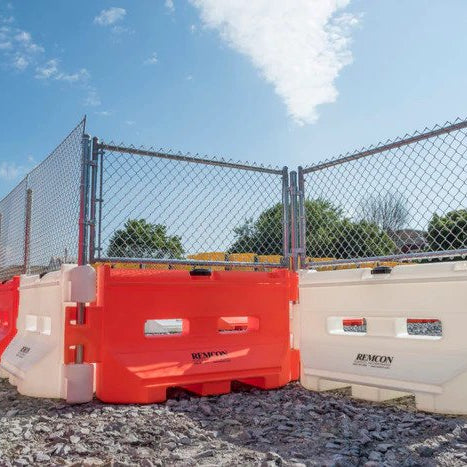 Remcon Guardsafe 36 water filled traffic barriers deployed in a construction work zone
