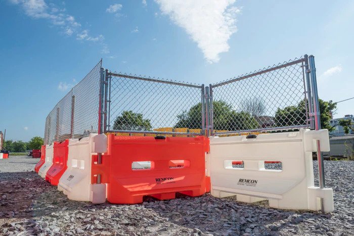 Remcon Guardsafe 36 water filled traffic barriers deployed in a construction work zone